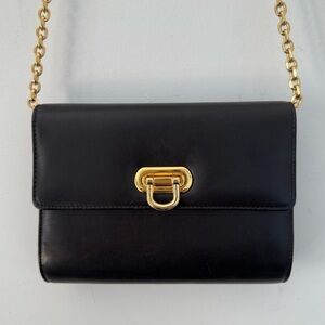 Vintage Holt Renfrew black leather small crossbody clutch bag with gold hardware